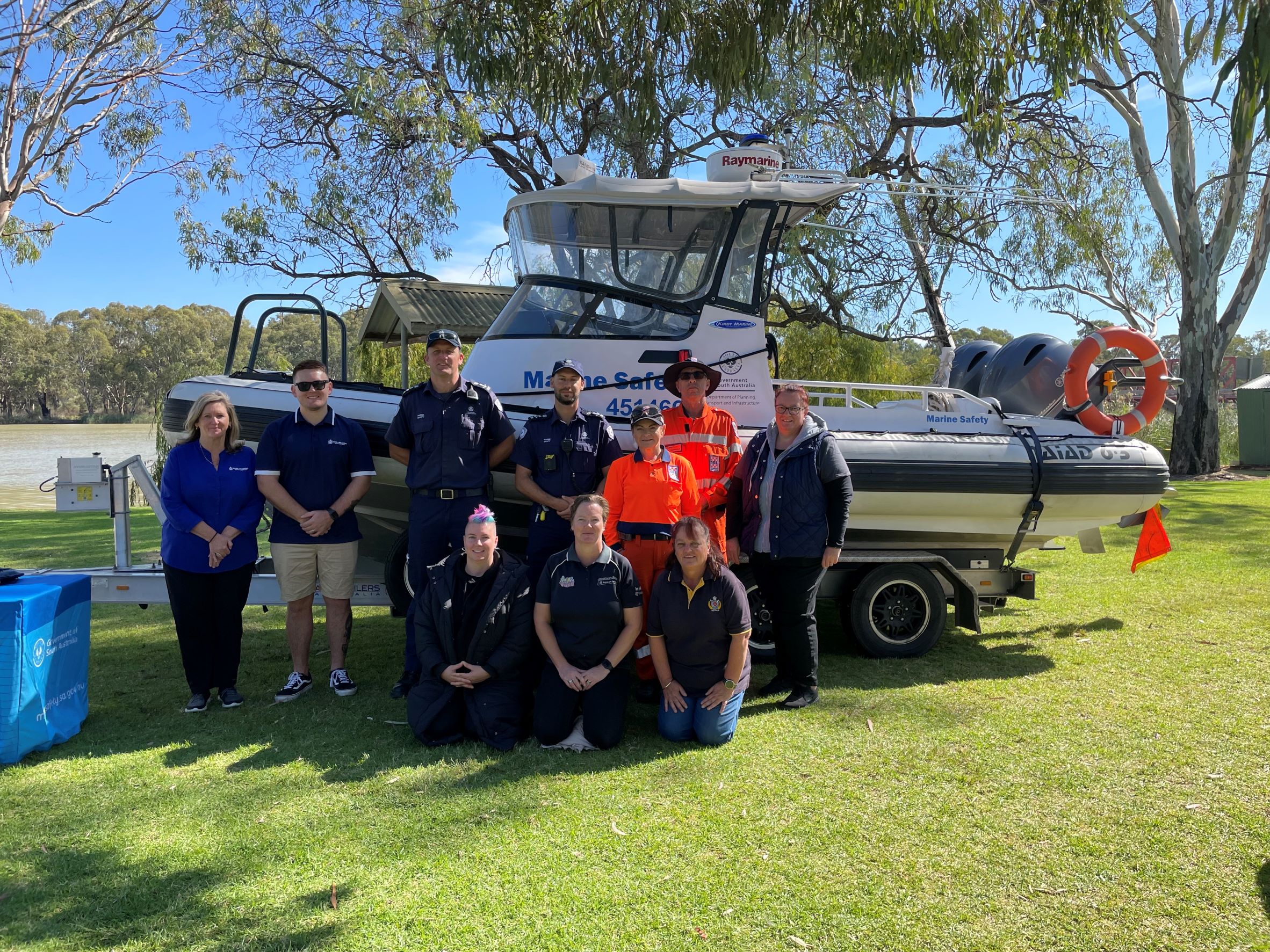 Marine Safety Officers and Volunteers at River Safety Day in front of Marine Safety SA boat