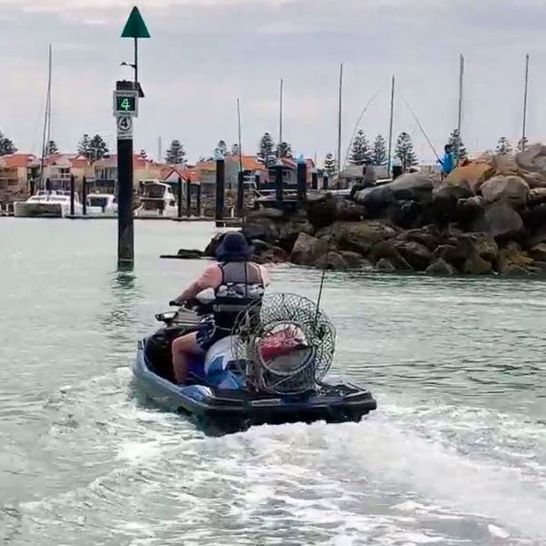 A jet ski travelling at 4 knots according to the electronic speed sign on the river