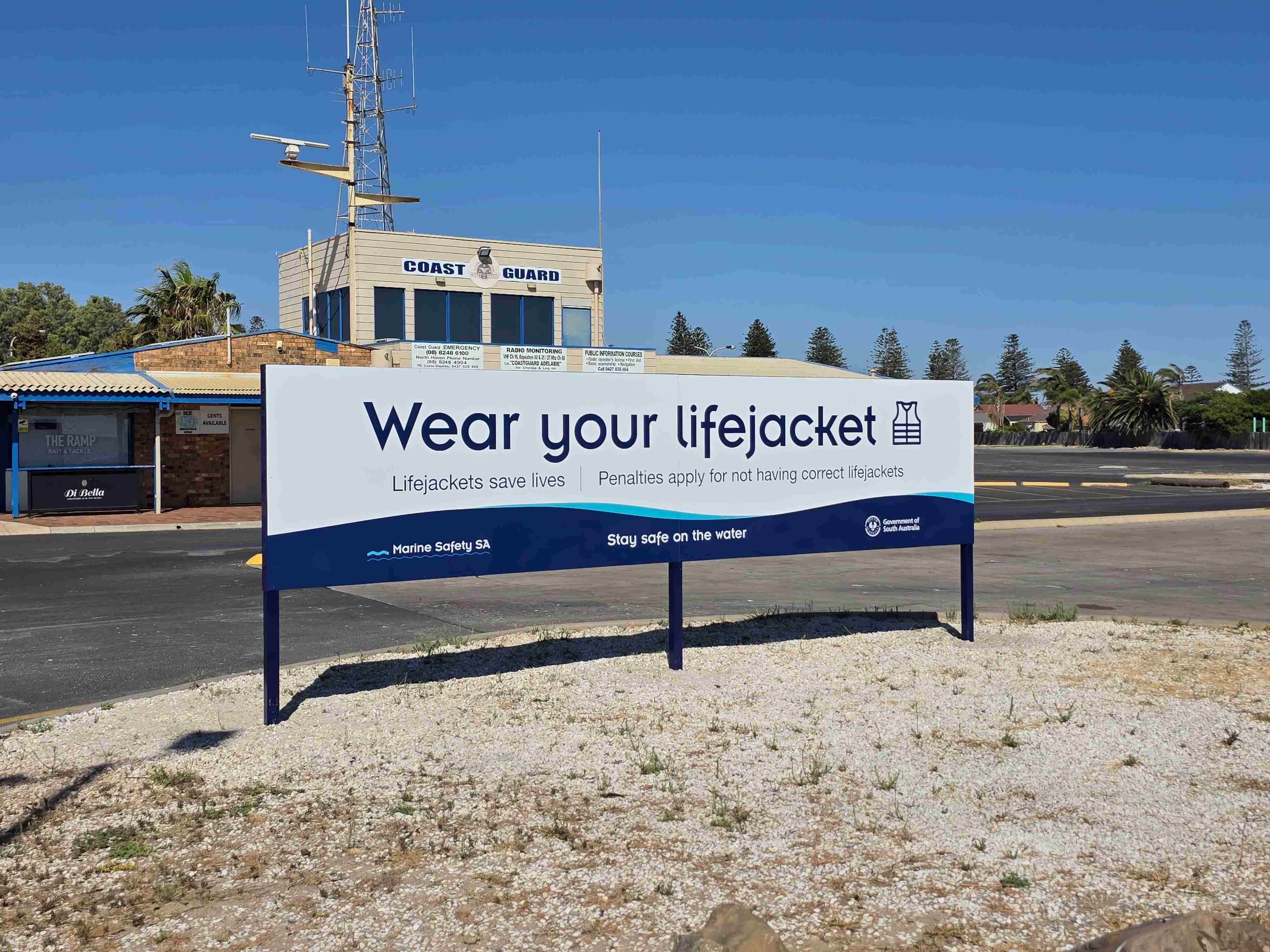 Pictured is a sign that states 'wear your lifejacket' as a reminder for people heading out on the water.