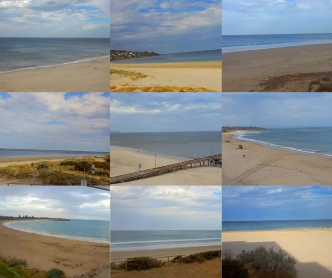 The image is a collage of nine live camera views showing coastal conditions at a beach. The photographs capture different angles of a sandy shoreline, calm to moderate ocean conditions, and a partly cloudy sky. Several views show wide stretches of beach with gentle waves breaking along the shore, while others look across the water toward the horizon and nearby coastal suburbs.  One image includes a jetty extending over the sand and water, while others show beach dunes, coastal vegetation, and pathways leading to the shoreline. The sea appears relatively calm across all camera views, with varying shades of blue and grey reflecting the changing light and cloud cover. The collage demonstrates how live coastal cameras can provide boaters, beachgoers and other water users with real-time information about weather, sea state and beach conditions before visiting the area.
