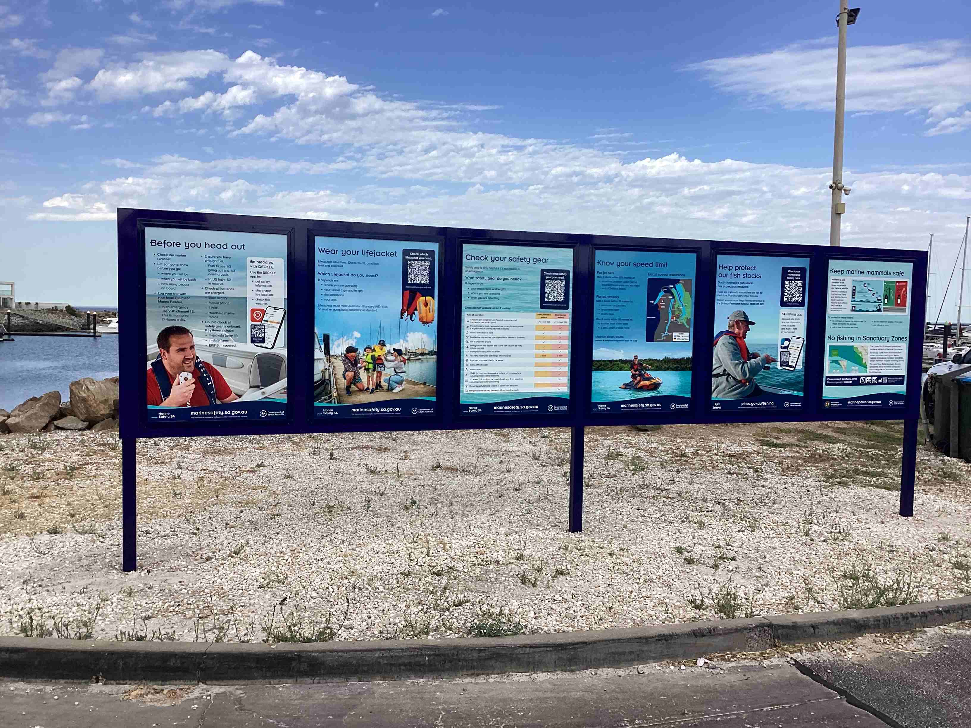 Pictured is a 6 panel sign on our coastal boat ramp which provides all information from Marine Safety, Department for Environment and Water and the Department of Primary Industries and Regions. The sign is outlined with black and the signed panels have images and blue background to match the ocean and water.