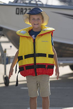Too big - This child could easily slide out of this lifejacket