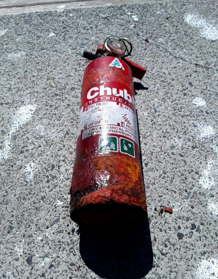 Damaged fire extinguisher