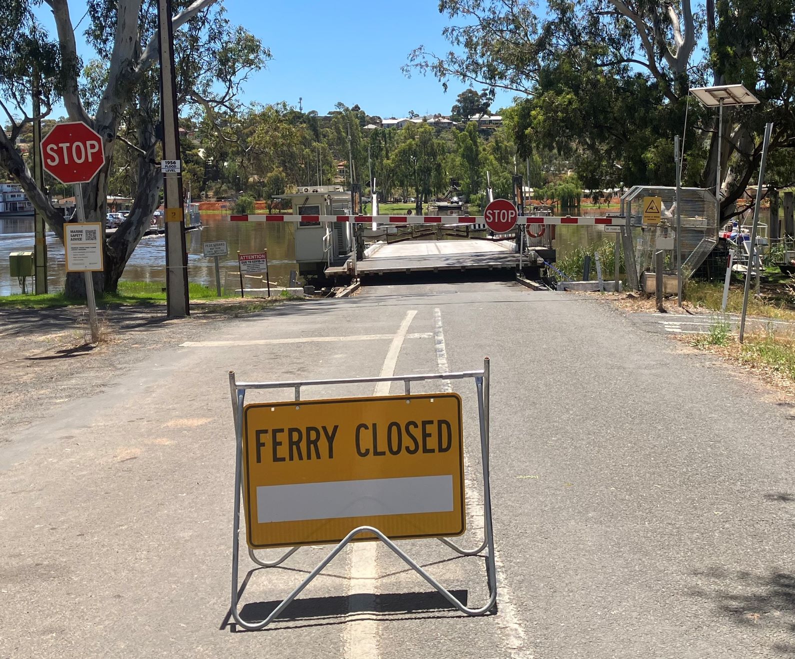Ferry closed sign on road leading to ferry